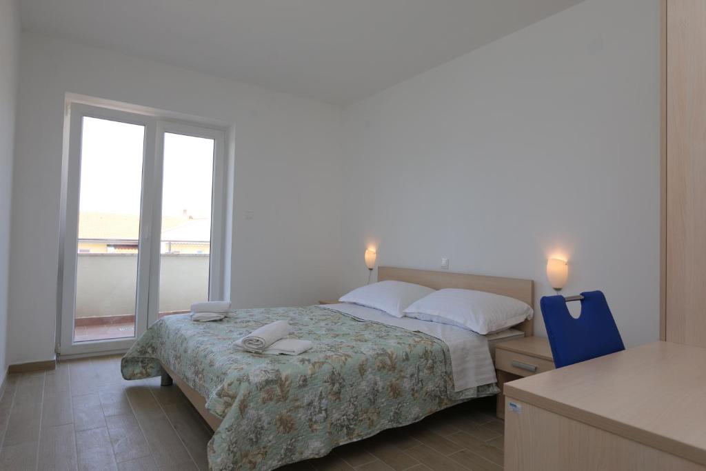 Кровать или кровати в номере Apartments Sucic Iva i Tea