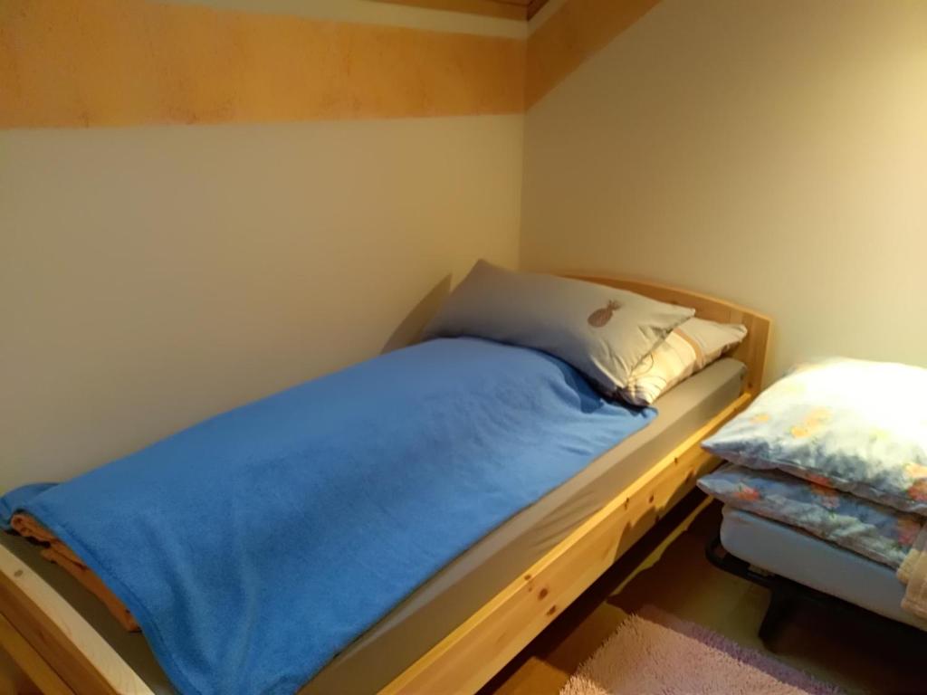 Postel nebo postele na pokoji v ubytování Ferienhaus Gstoderblick