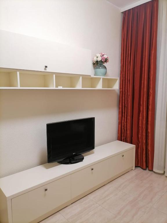 TV a/nebo společenská místnost v ubytování Hotel Florentina