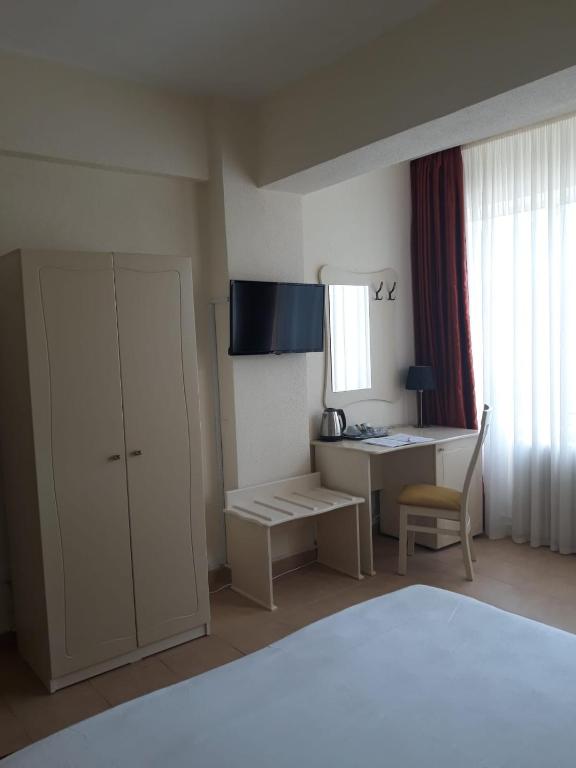 TV a/nebo společenská místnost v ubytování Hotel Florentina