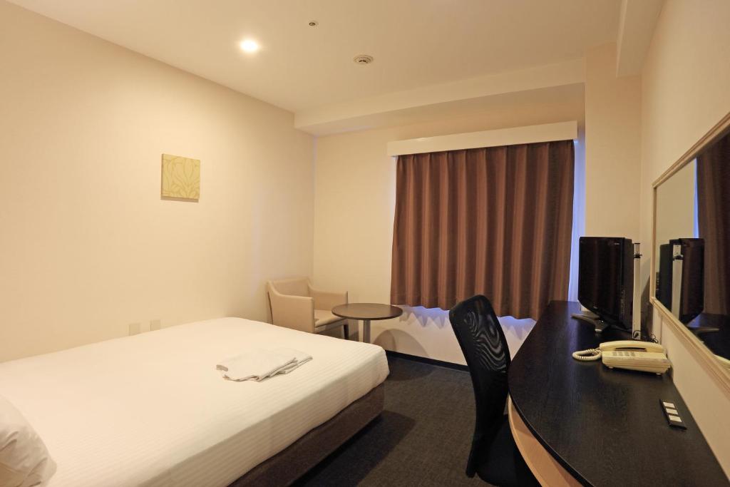 TV a/nebo společenská místnost v ubytování Smile Hotel Kyoto Shijo