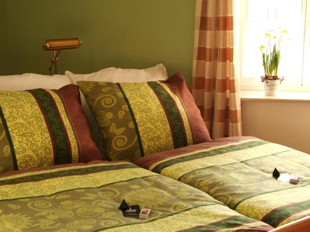 Postel nebo postele na pokoji v ubytování Ferienwohnung Zum Karzl