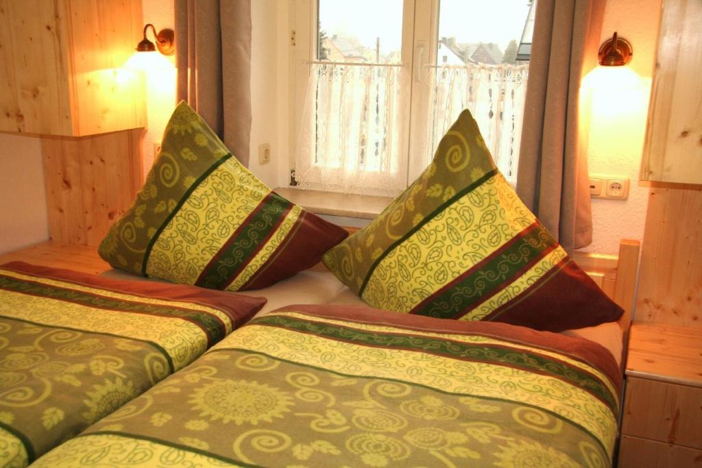 Postel nebo postele na pokoji v ubytování Ferienwohnung Zum Karzl