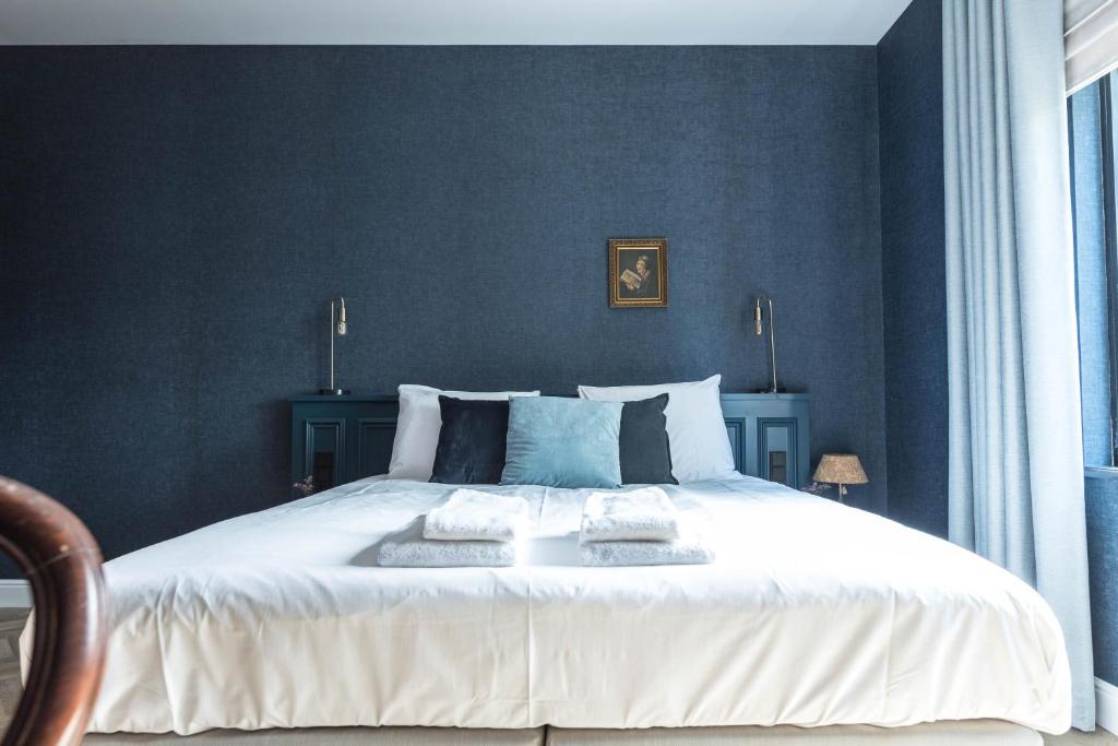 Postel nebo postele na pokoji v ubytování Ysbrantsz Boutique Hotel