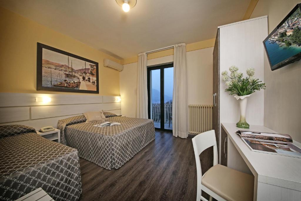 TV a/nebo společenská místnost v ubytování Hotel Panoramica
