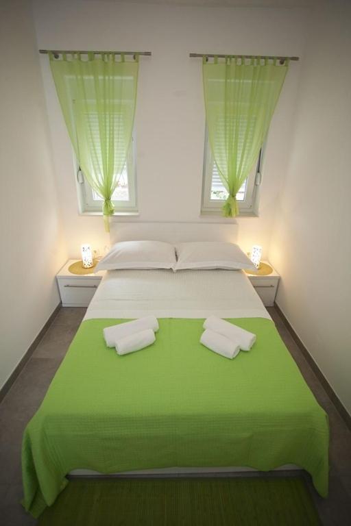 Posteľ alebo postele v izbe v ubytovaní House Duce (850)
