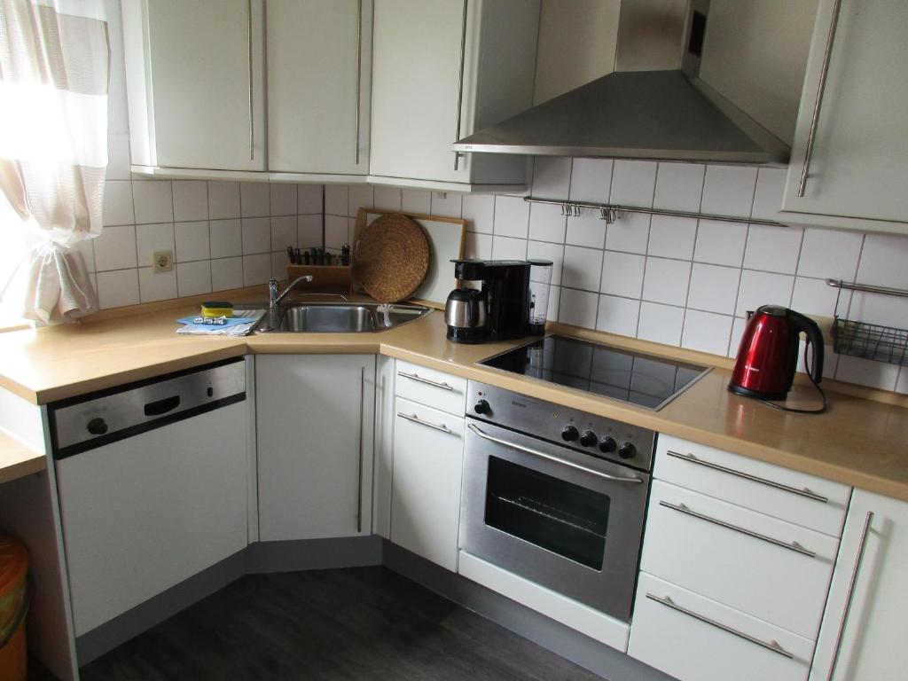 Kuchyň nebo kuchyňský kout v ubytování Ferienhaus Weitblick