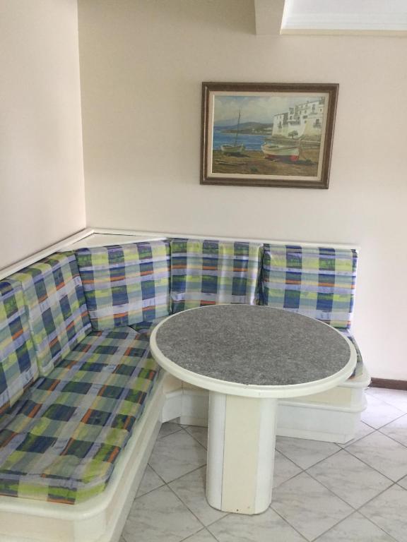 Uma área de estar em Pousada Vila Del Mare - Frente Praia
