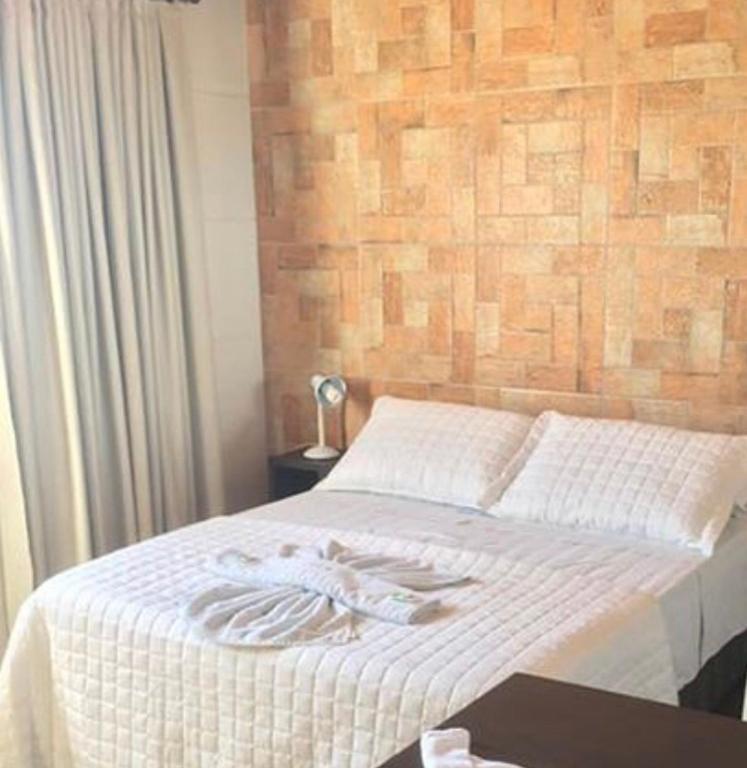 Cama ou camas em um quarto em Pousada Vila Del Mare - Frente Praia