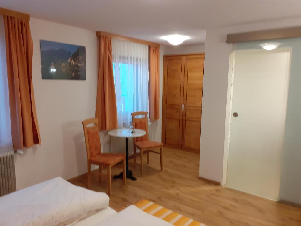 Postel nebo postele na pokoji v ubytování Pension Hirlatz