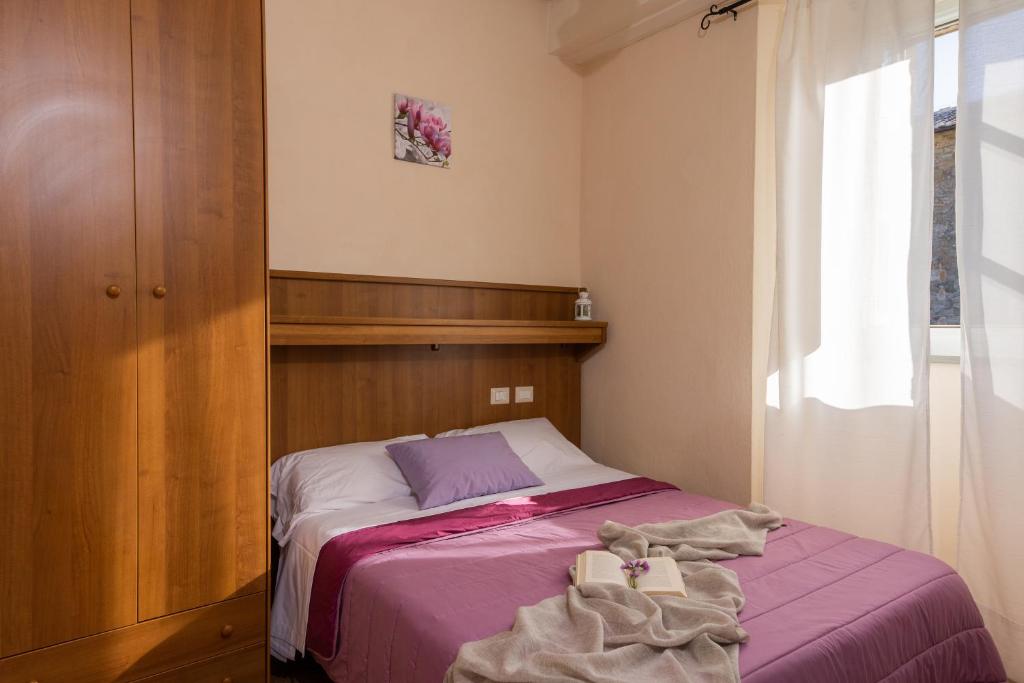 Łóżko lub łóżka w pokoju w obiekcie B&B San Francesco