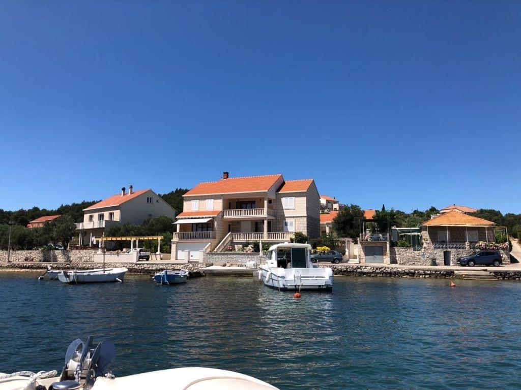a group of boats are docked in a harbor at Ferienhaus SIKLUH-128-4 in Lumbarda