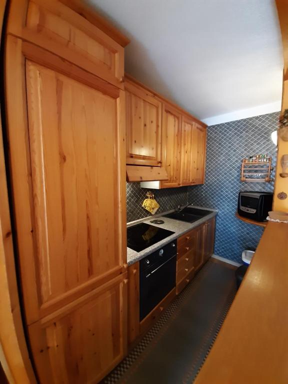 Kuchyň nebo kuchyňský kout v ubytování Maison Giada
