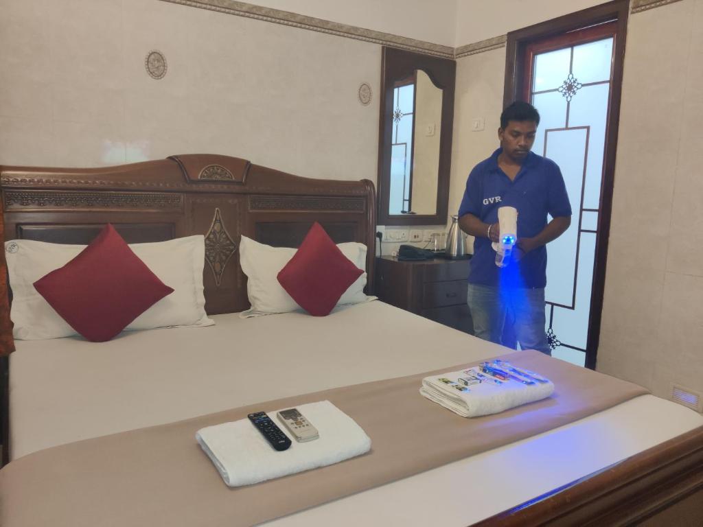 Členové personálu v ubytování Grand View Residency Chennai