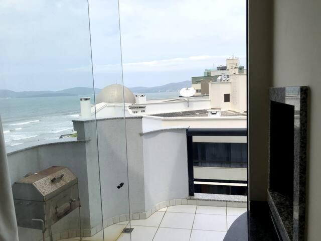  Cobertura duplex frente para o mar