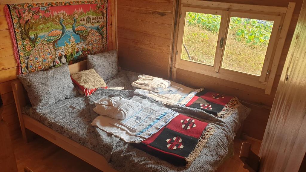 Tempat tidur dalam kamar di API CENTAR BRĐANI