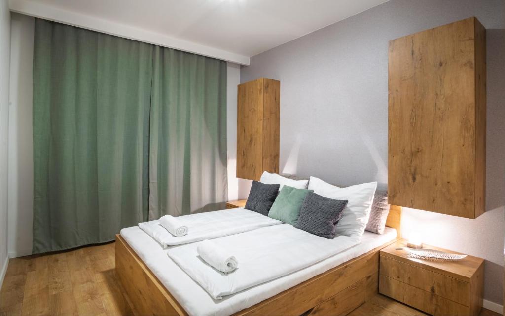 Łóżko lub łóżka w pokoju w obiekcie MyFlat Casa Panorama Apartment