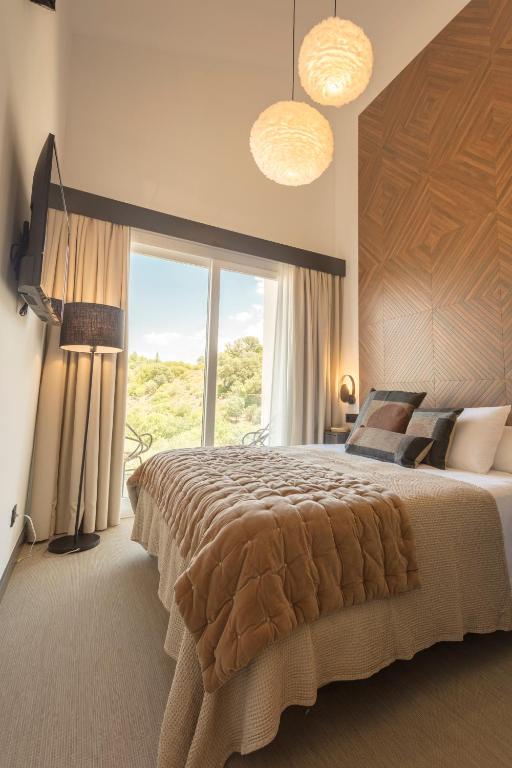 Cama o camas de una habitación en Hacienda Fresneda María by Charming Stay Adults Recommended