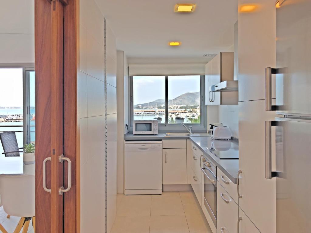 Kuchyň nebo kuchyňský kout v ubytování Cofradia Penthouse