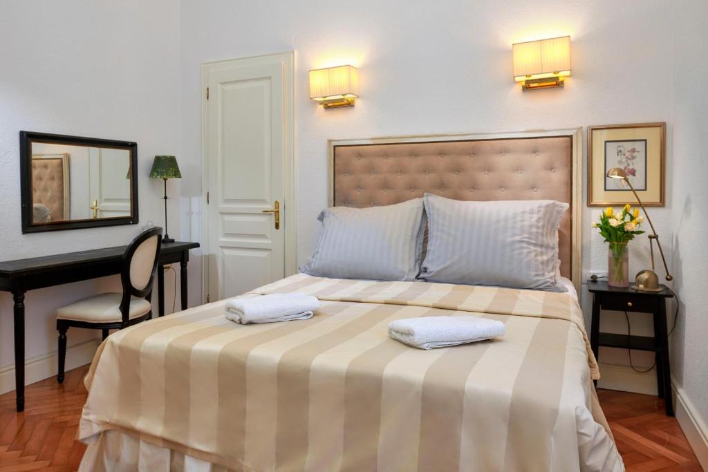Posteľ alebo postele v izbe v ubytovaní Casa Dei Fiori