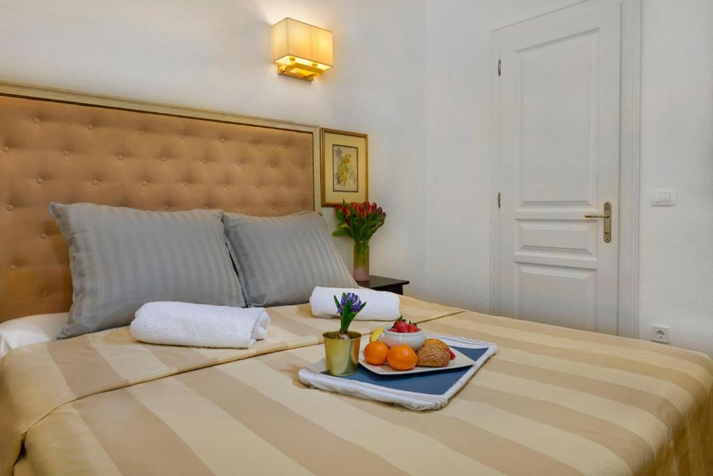 Posteľ alebo postele v izbe v ubytovaní Casa Dei Fiori