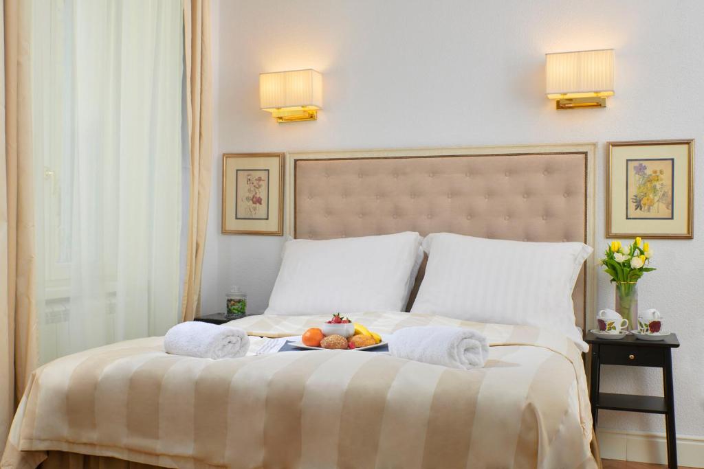Posteľ alebo postele v izbe v ubytovaní Casa Dei Fiori