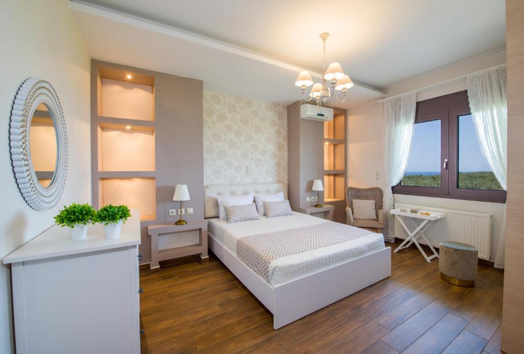 Postel nebo postele na pokoji v ubytování Villa Elisabeth View