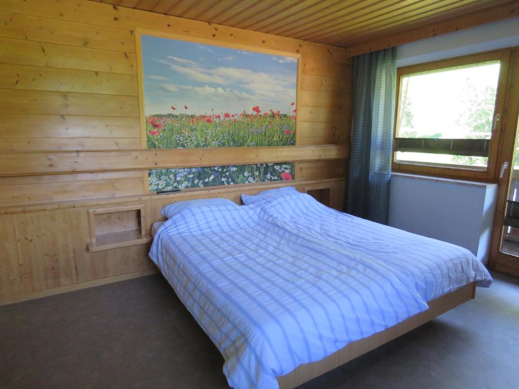 Posteľ alebo postele v izbe v ubytovaní Alpenhaus Denver