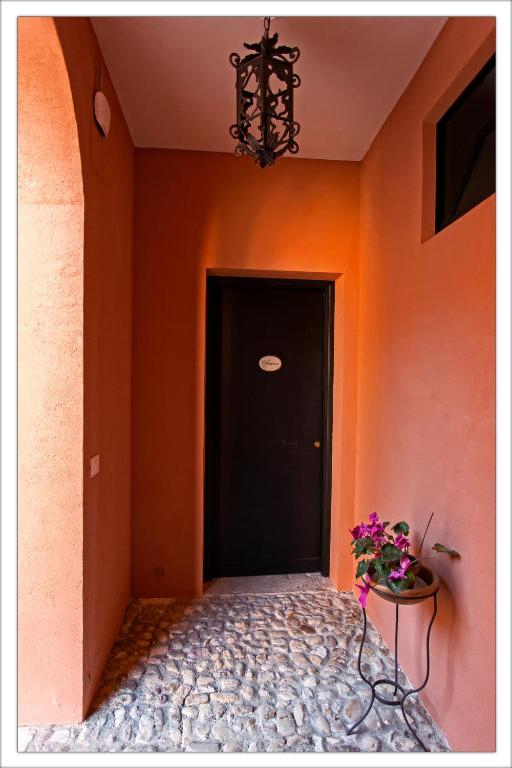 TV a/nebo společenská místnost v ubytování AGRITURISMO CASA VACANZE Antico Baglio