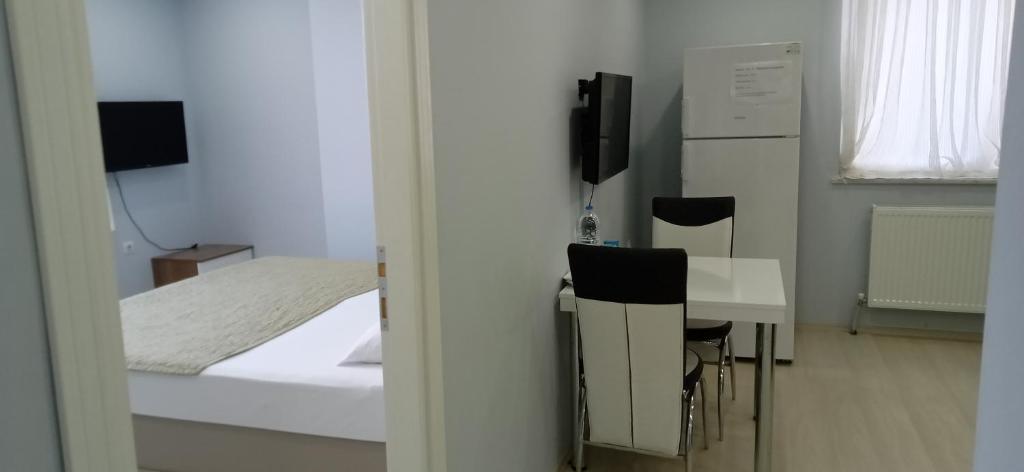 TV a/nebo společenská místnost v ubytování Hannapart Otel
