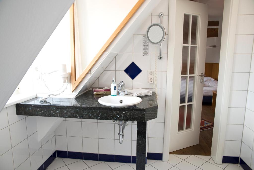 Koupelna v ubytování Hotel Weber
