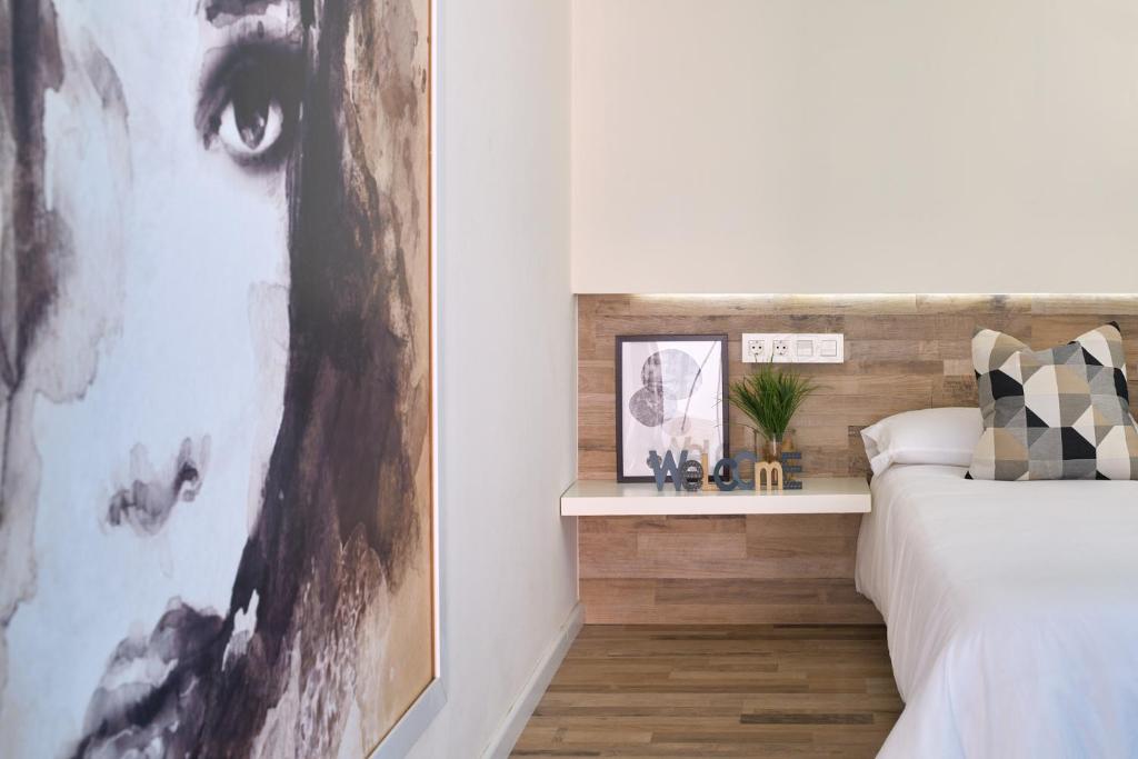 Posteľ alebo postele v izbe v ubytovaní Vestal Suites Classic