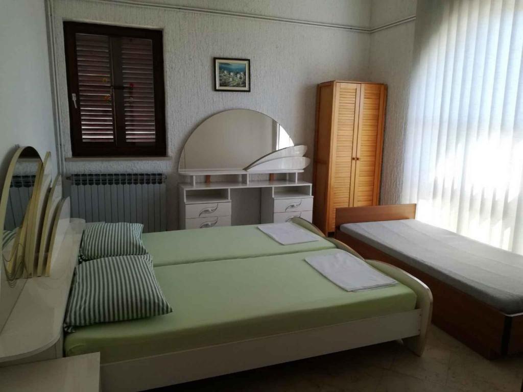 Posteľ alebo postele v izbe v ubytovaní Apartment Sv. Juraj 4