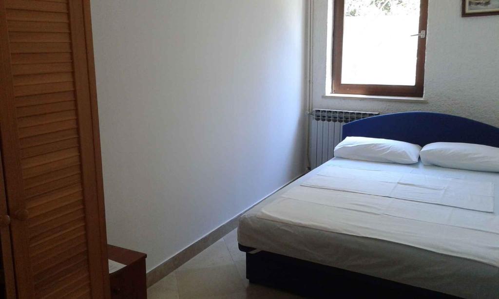 Posteľ alebo postele v izbe v ubytovaní Apartment Sv. Juraj 4