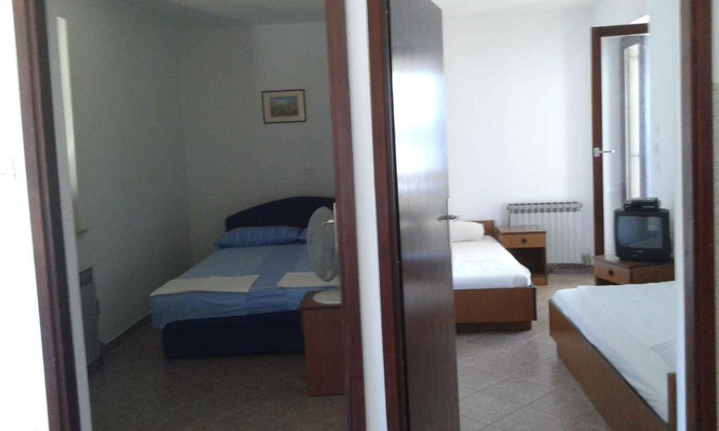 Posteľ alebo postele v izbe v ubytovaní Apartment Sv. Juraj 1