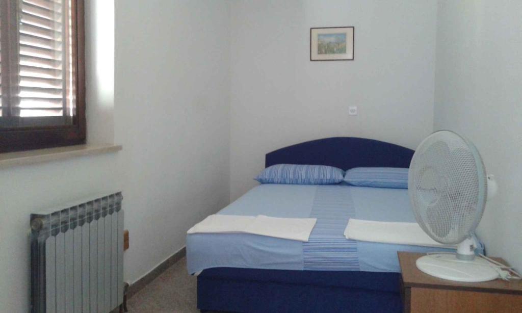 Posteľ alebo postele v izbe v ubytovaní Apartment Sv. Juraj 1