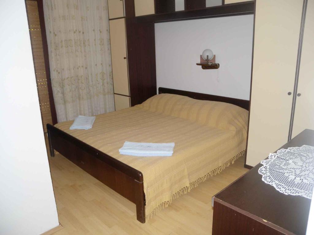 Posteľ alebo postele v izbe v ubytovaní Apartment Kampor 5