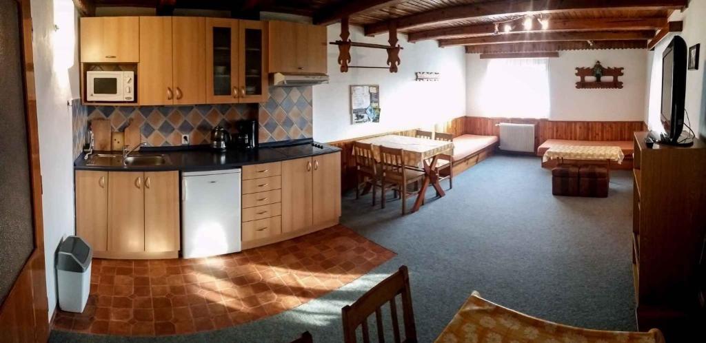 Łóżko lub łóżka w pokoju w obiekcie Apartment Rokytnice nad Jizerou 6