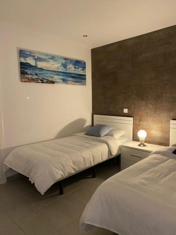 Postel nebo postele na pokoji v ubytování Sonneland Canary Spa
