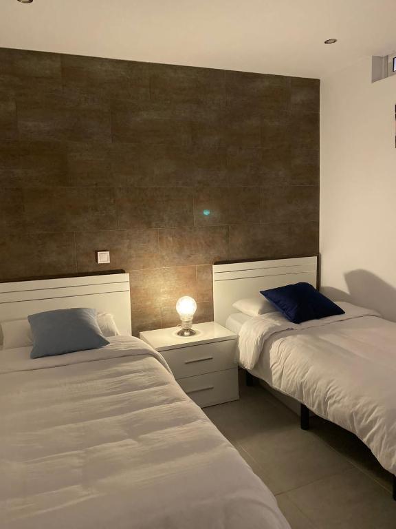 Postel nebo postele na pokoji v ubytování Sonneland Canary Spa