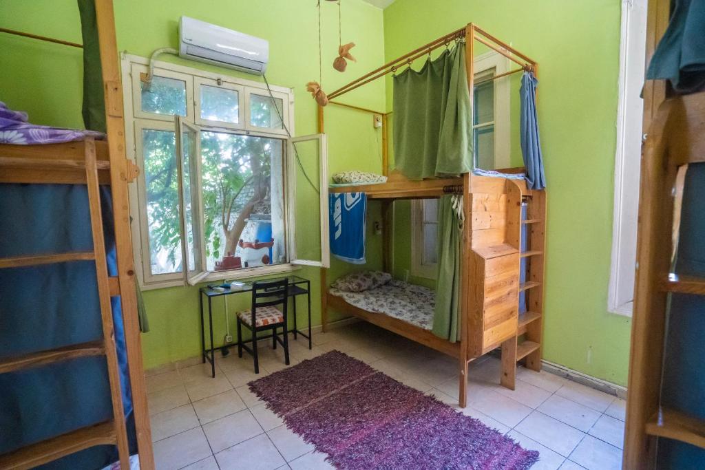 Postel nebo postele na pokoji v ubytování Lotus Garden Hostel Izmir