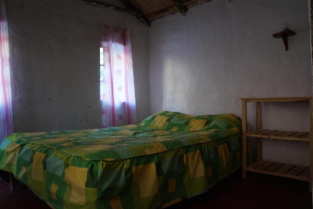 Postel nebo postele na pokoji v ubytování Paraiso Las Palmeras Lodge