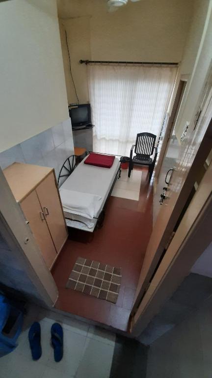 Postel nebo postele na pokoji v ubytování Shanthi Comforts