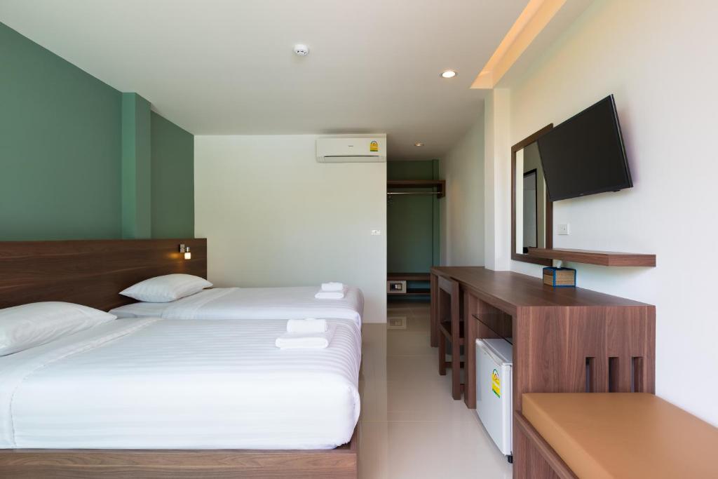 Postel nebo postele na pokoji v ubytování Parida Resort