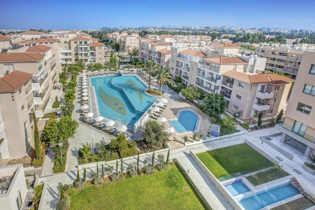 an aerial view of an apartment complex with a swimming pool at Elysia Park in Paphos