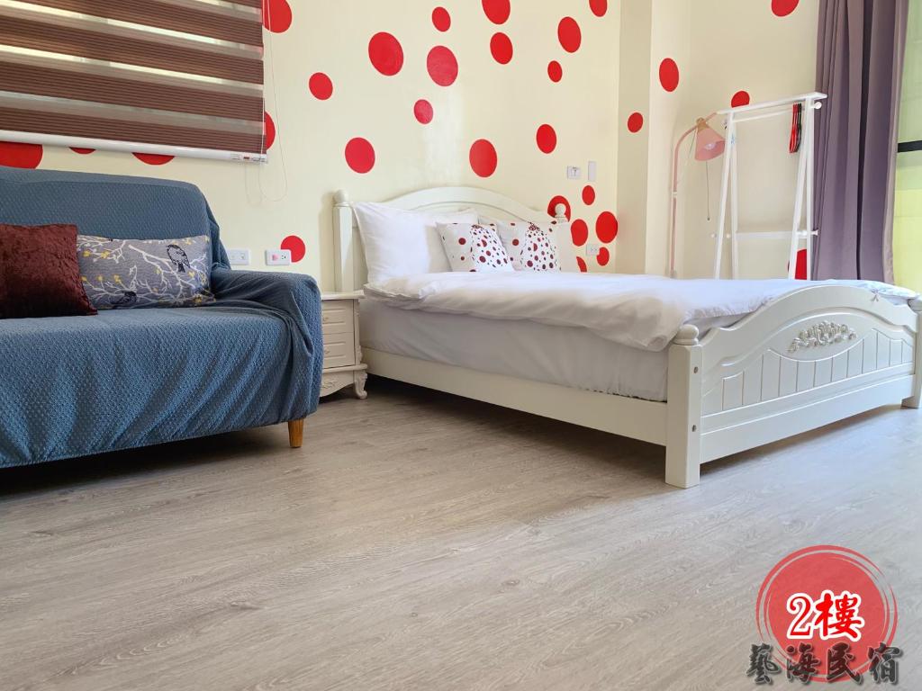 Postel nebo postele na pokoji v ubytování Art Ocean B&B