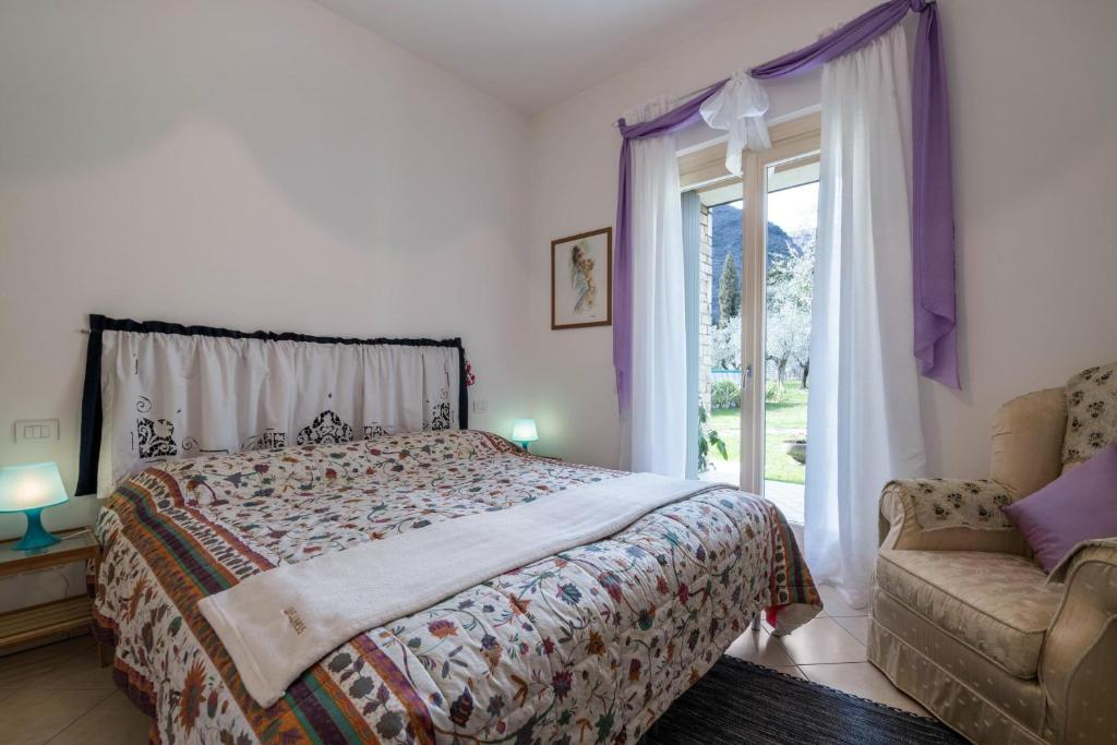 Posteľ alebo postele v izbe v ubytovaní Apartment Loretta in Villa Fiore