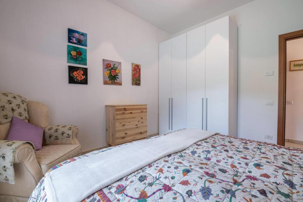Posteľ alebo postele v izbe v ubytovaní Apartment Loretta in Villa Fiore