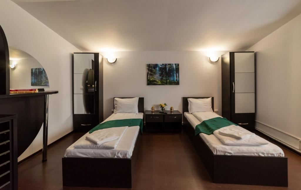 Escala Rooms - Estúdio Triplo Padrão