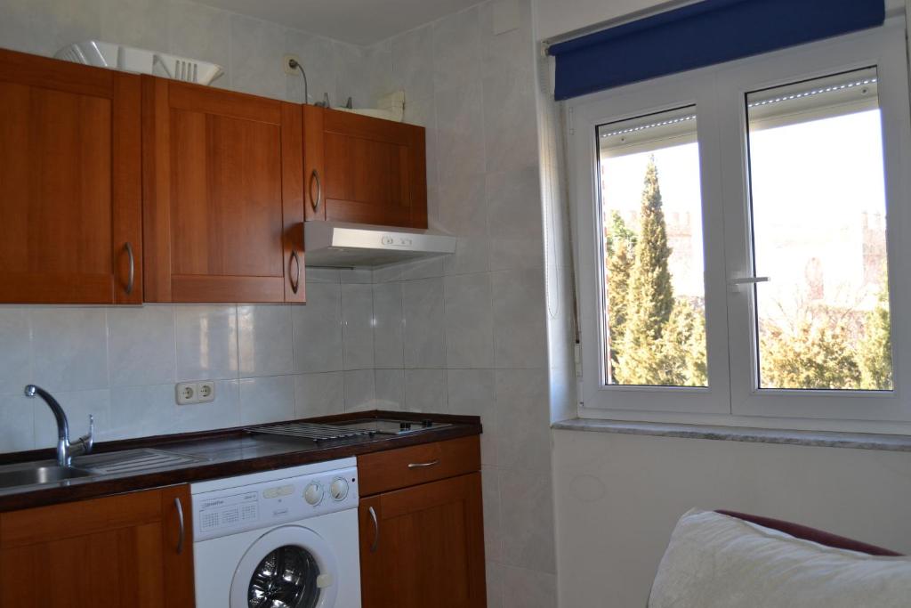 Kuchyň nebo kuchyňský kout v ubytování VuT Los Telares Muralla